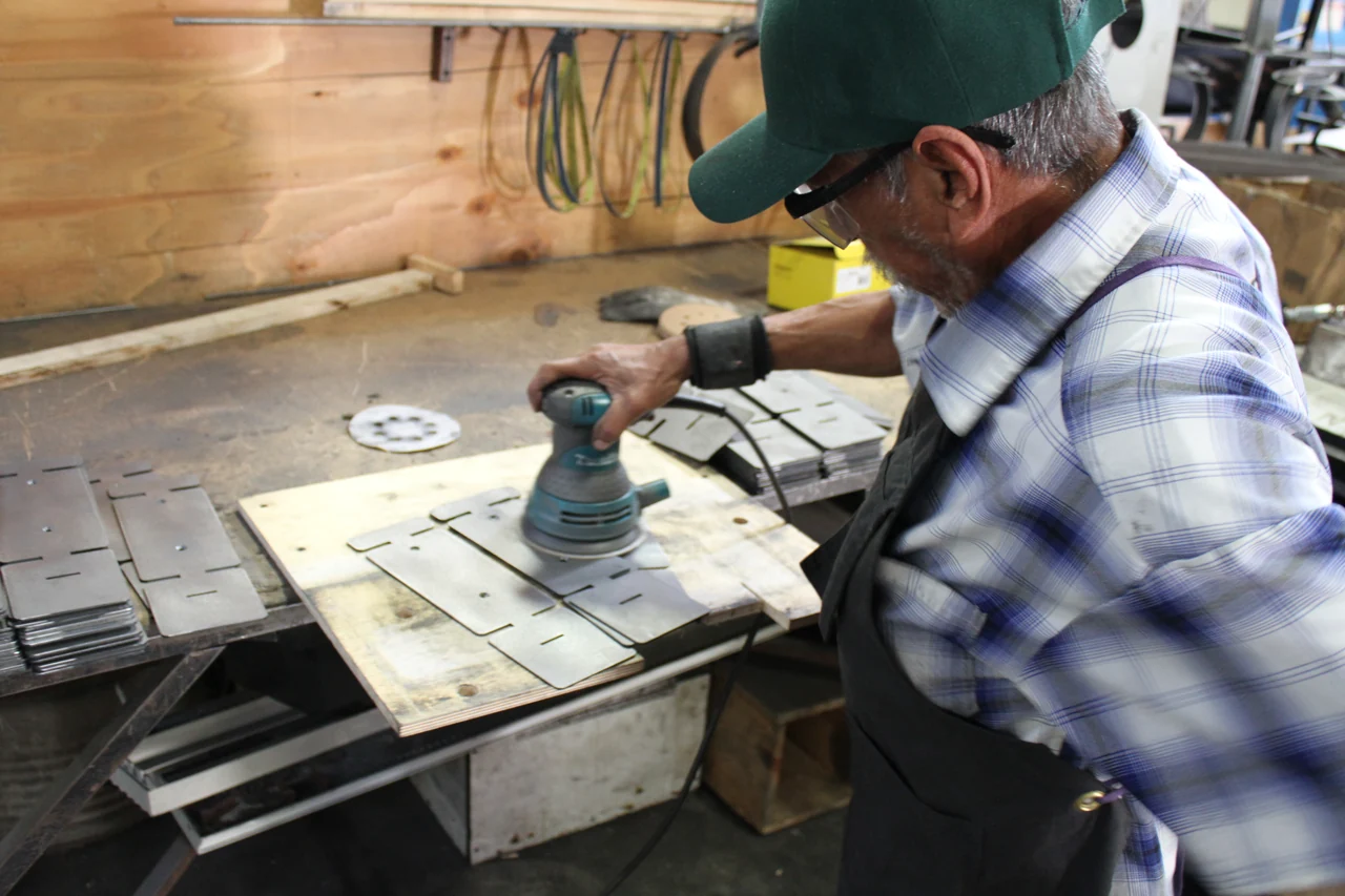 Hands-on metal finishing in FELBRO's manufacturing archive